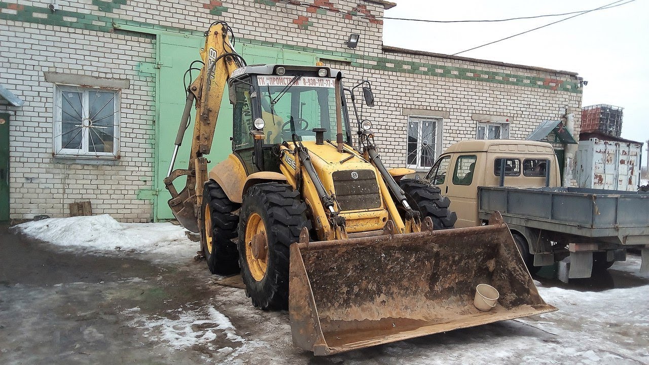 Ремонт КПП экскаватора-погрузчика New-Holland B115.