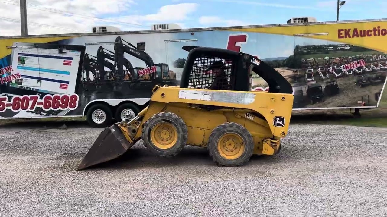 John Deere 317. Lot 240