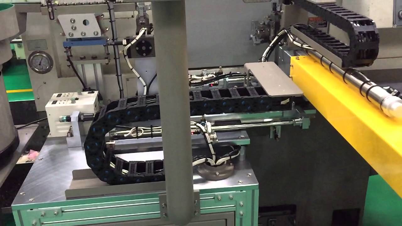 CNC LATHE AUTOLOADING SYS.