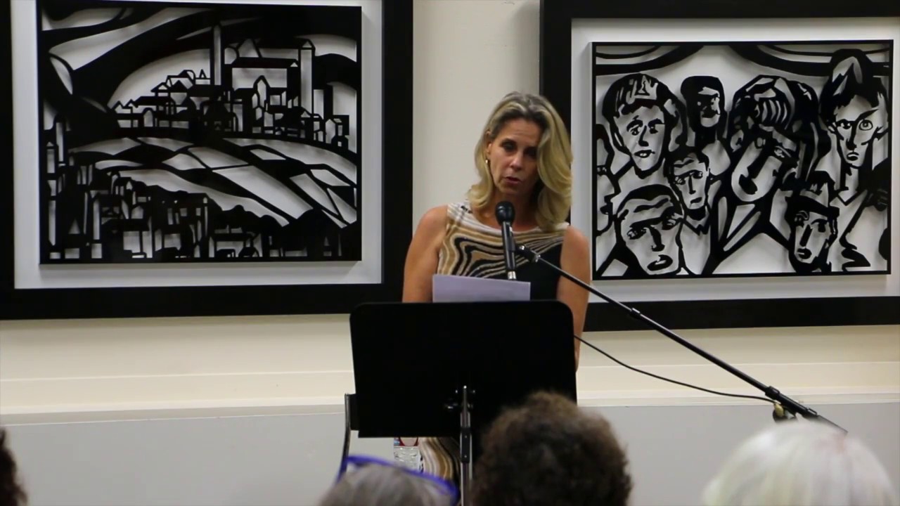 Jo Barrington reading poetry at Robert Firestone`s Art Gallery