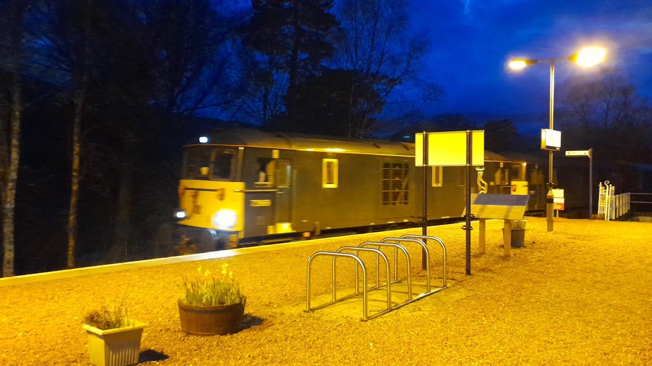 73969 and 73971 arrive at Bridge of Orchy with The Caledonian Sleeper on the 25th April 2022.