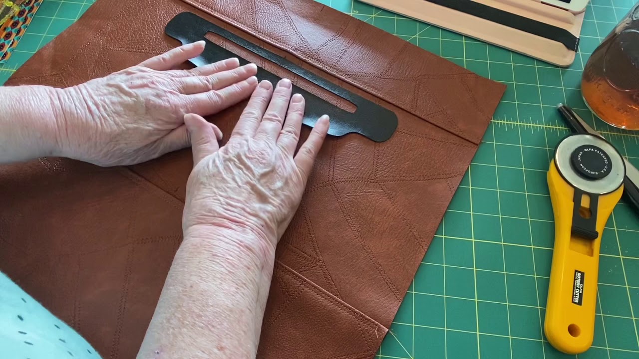 Adding a zipper overlay and exterior pocket to a bag...