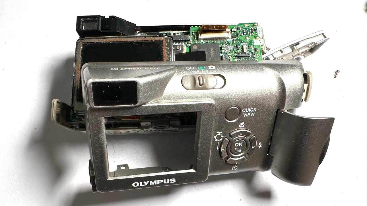 Olympus c 310 zoom disassembly and removal of a stuck memory card