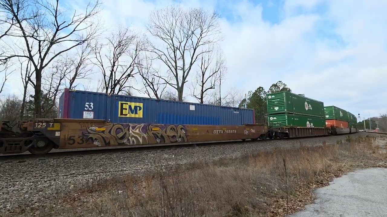 NS 4254 leads a long, southbound Intermodal at the tower...NS 4933 is the mid DPU 