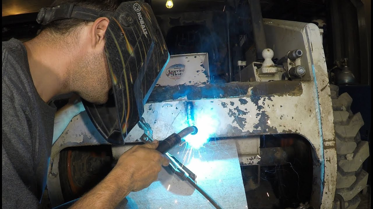 Welding a Bobcat loader