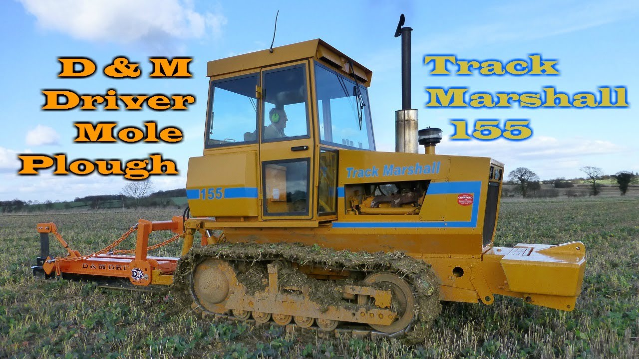 Track Marshall 155 pulling a D & M Driver Mole Plough