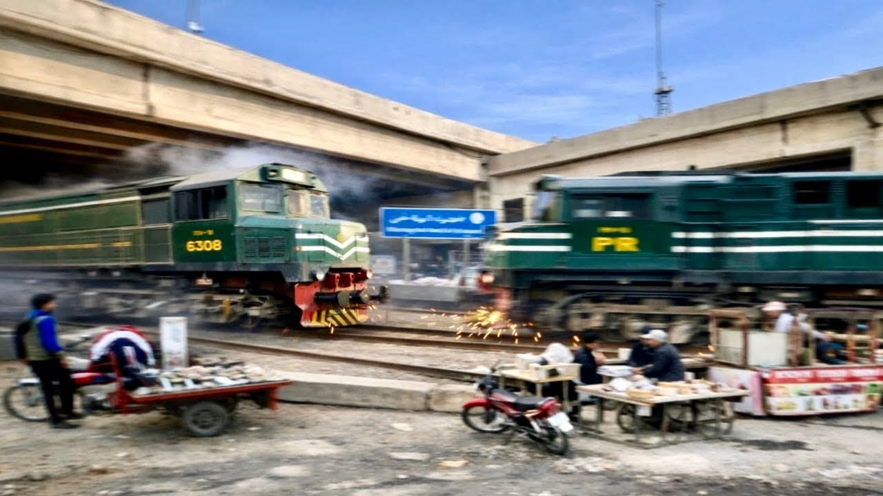 High Speed Pakistani Bullet Trains Passing Through The City 