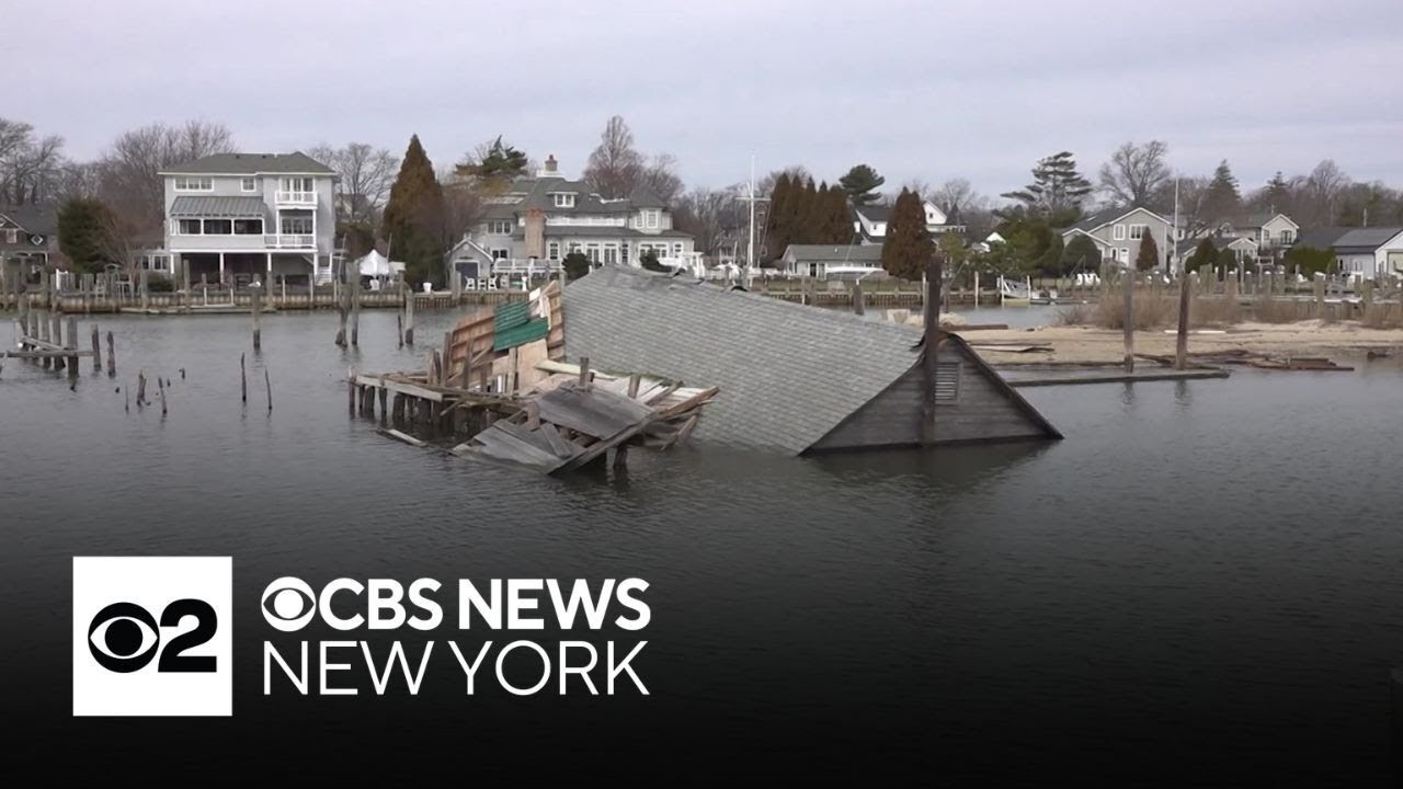 Last boathouse along Amityville River collapses