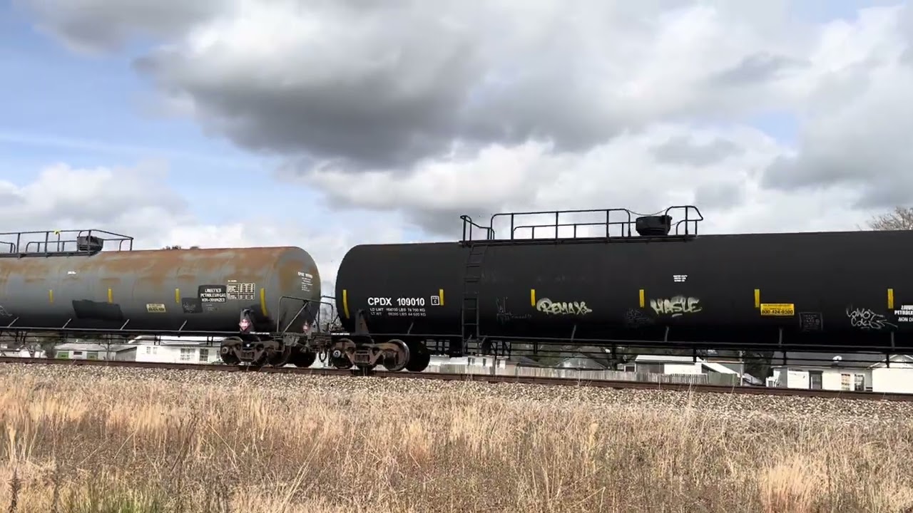 WB CSX 8000ft long with BNSF power awesome mixed freight and graffiti cool FEC fuel car. 