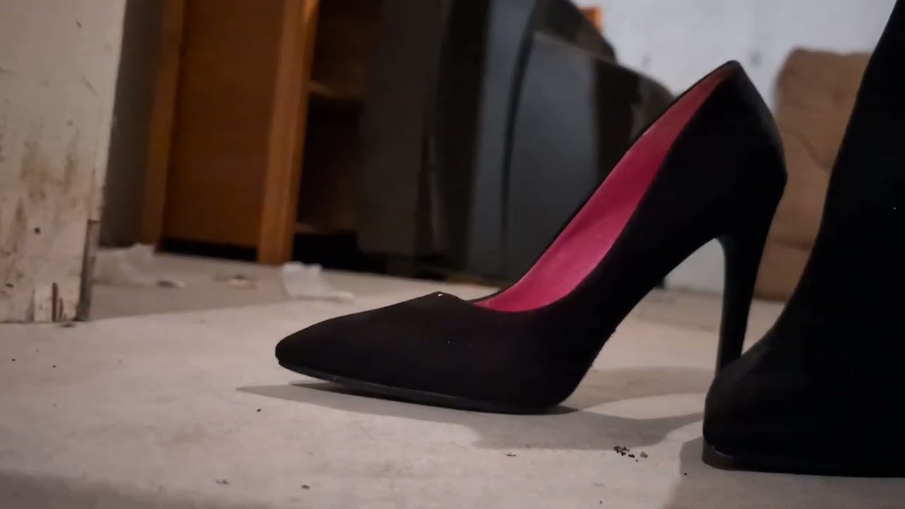 Black heels walking. Breaking heels tap. 