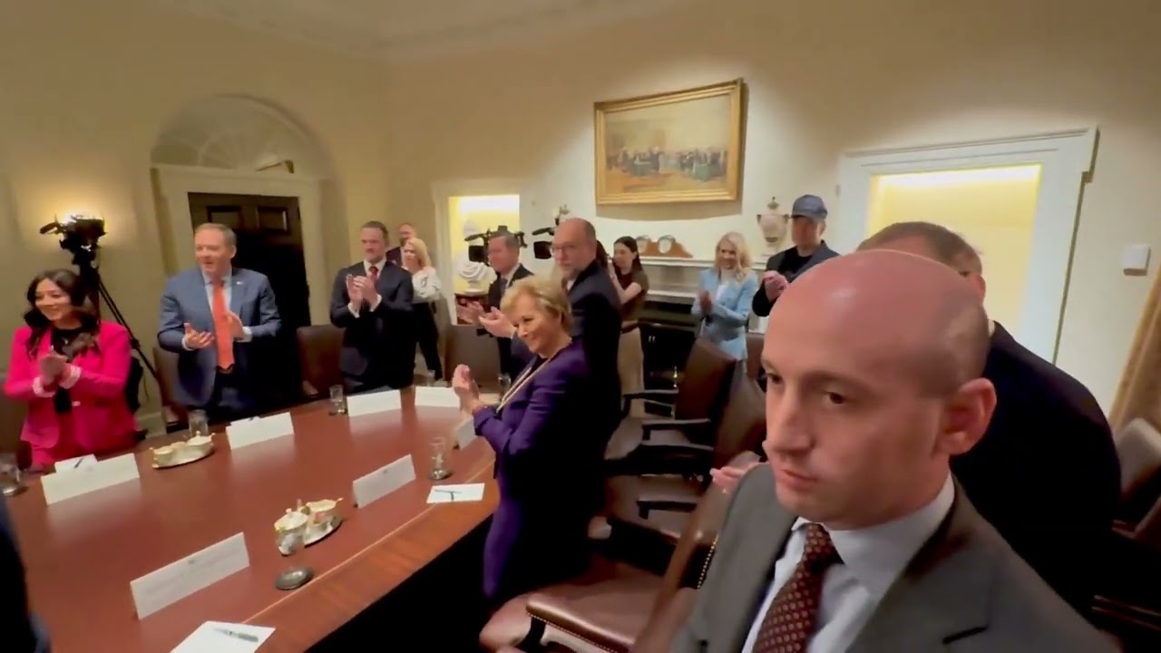 President Trump enters the Cabinet Room for his first Cabinet meeting
