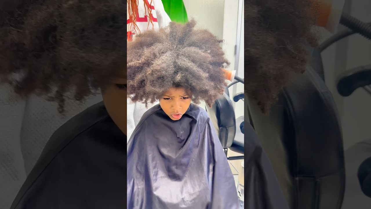 HIS FIRST HAIRCUT EVER!