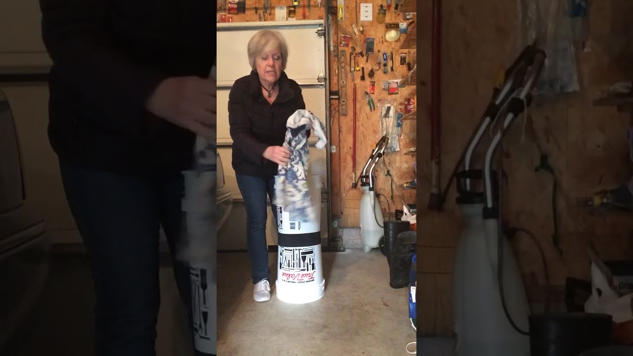 Standing bucket drum using Remo Rhythm Lid.