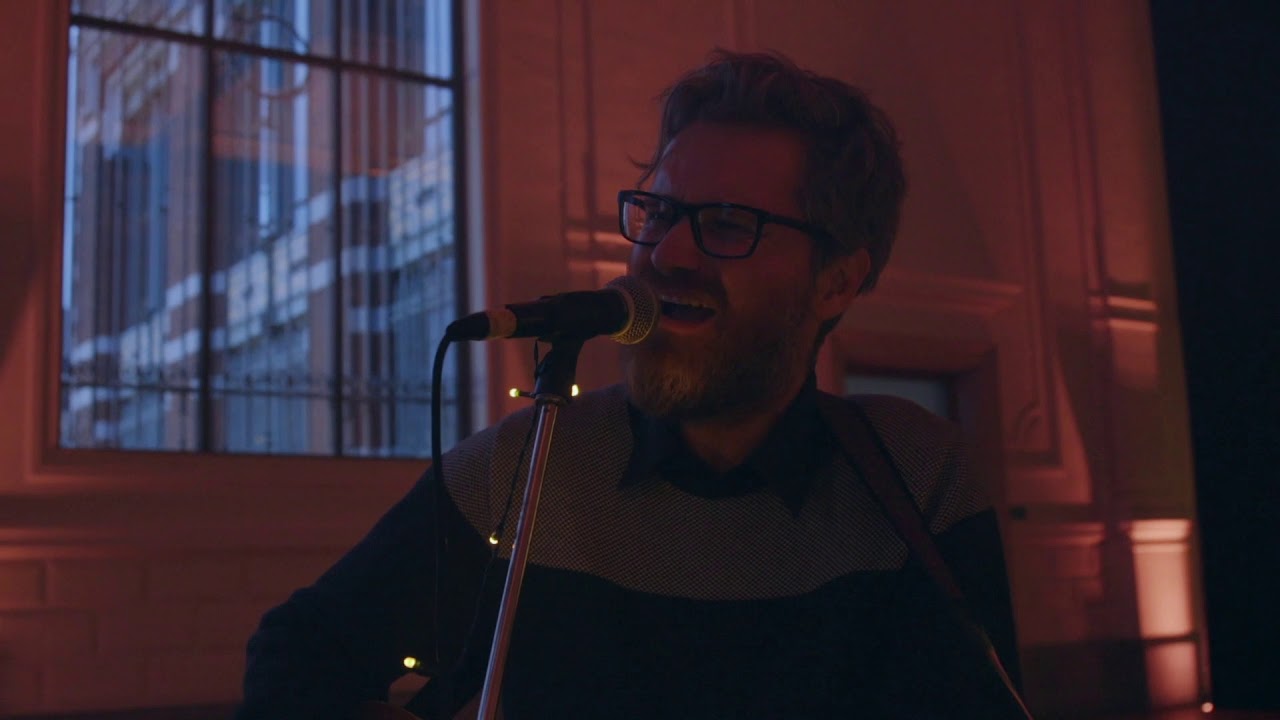 A Singer of Songs - The Man At The Table - Indies Keeping Secrets Brussels