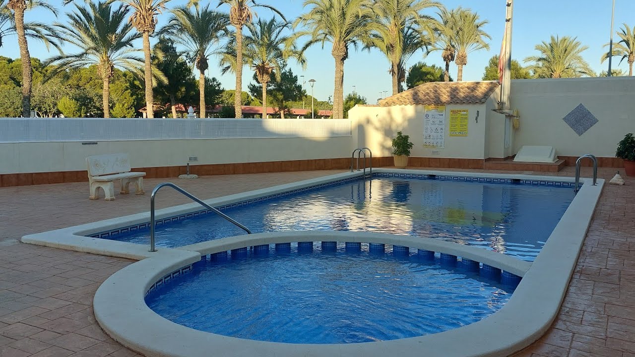 Semi detached Villa in Santiago de la Ribera with communal pool.