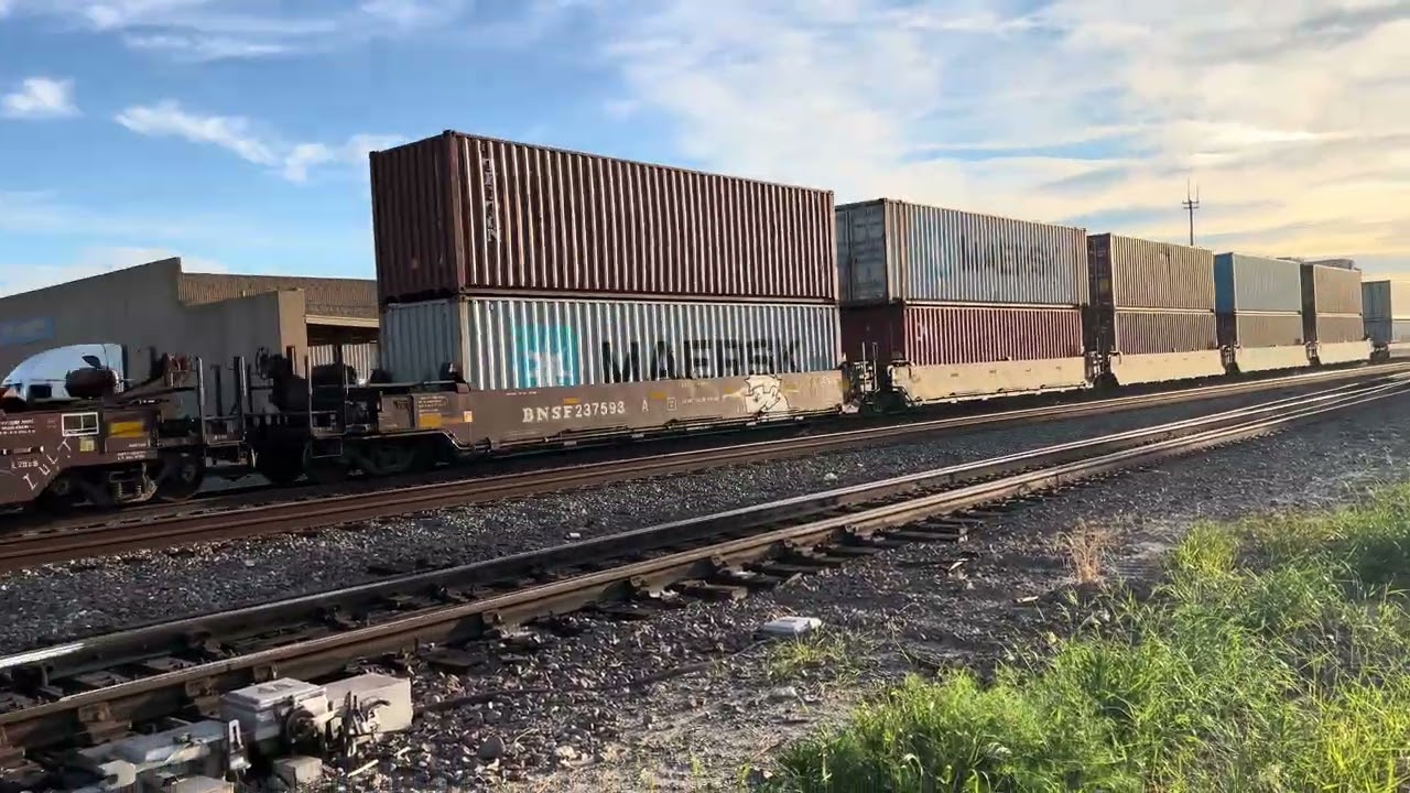 W/B BNSF Port Stack passes through Fullerton Station. 3/14/26.