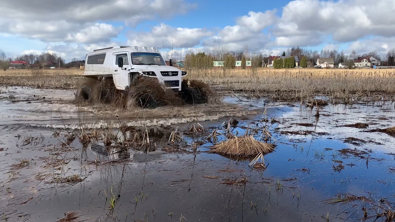 Вездеход Литвина на шинах 1450 мм.570 мм дорожный просвет Litvin's all-terrain vehicle on tires 1450