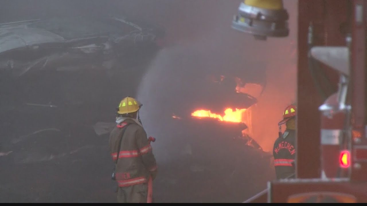 BREAKING - Crews continue to battle massive scrapyard fire in Benwood