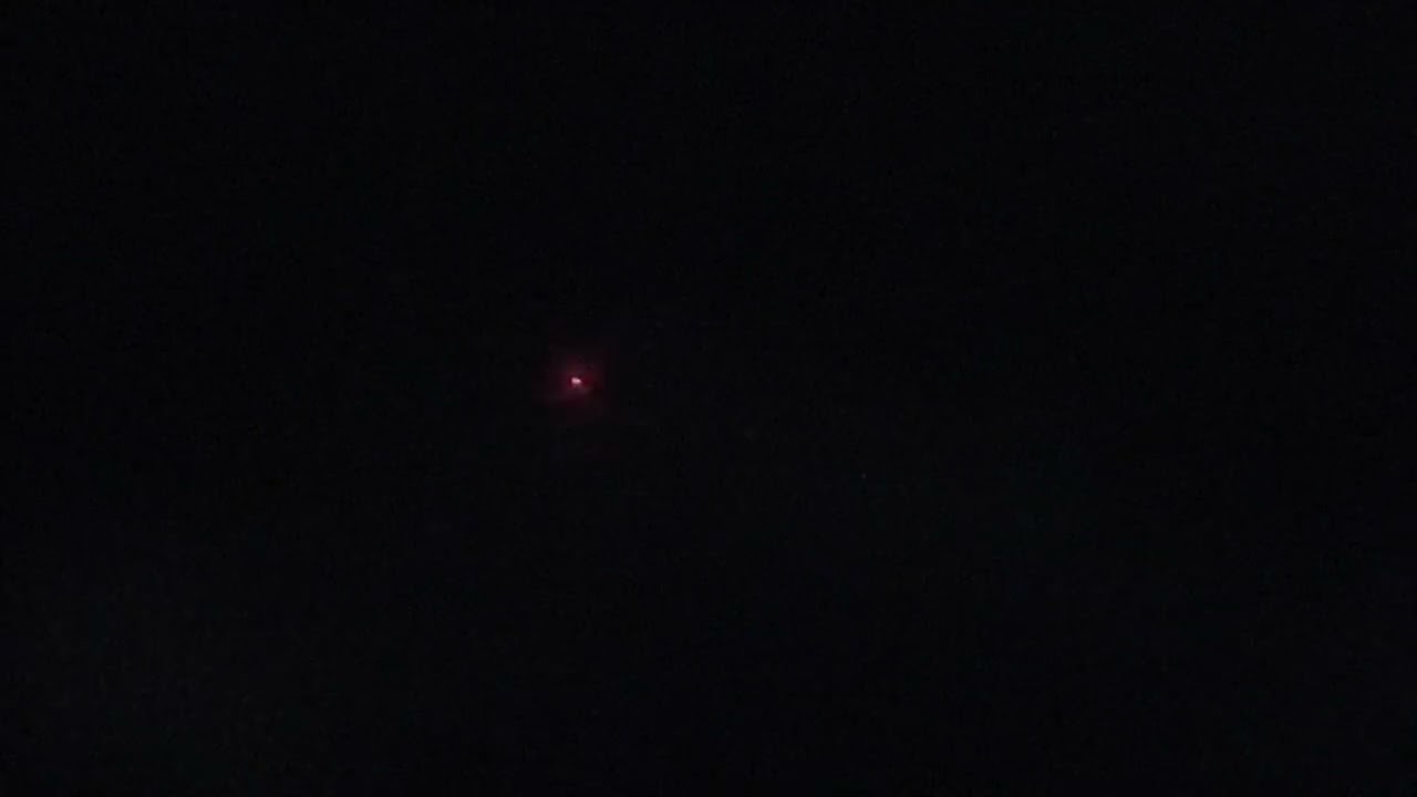 Private Aerospatiale AS350 [G-NIPL] flying above at night