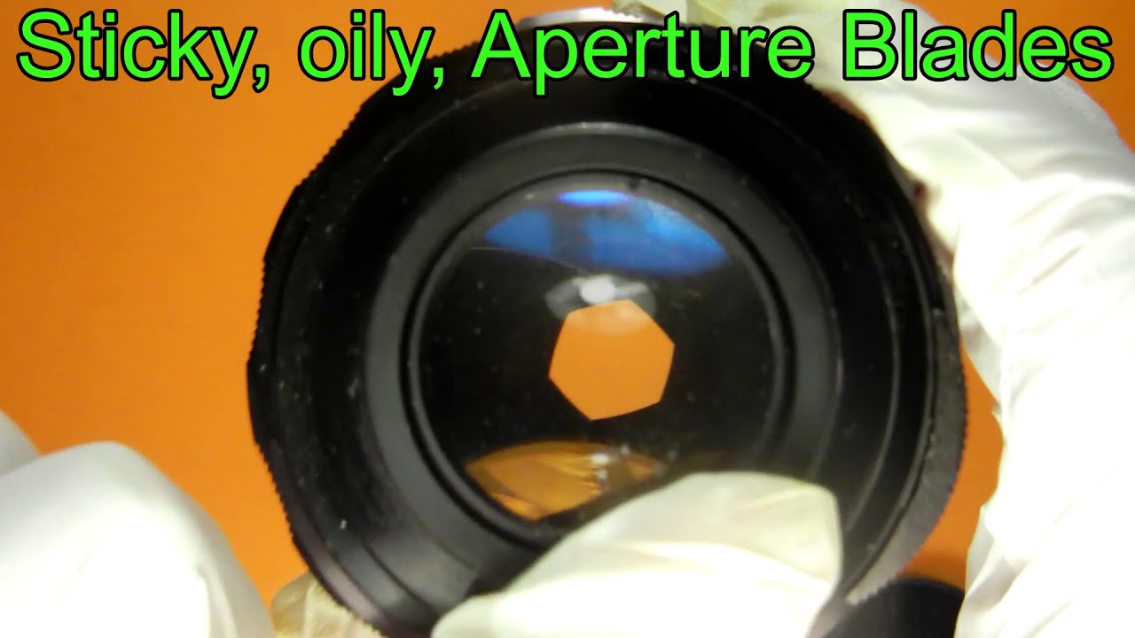 Repairing sticky aperture blades on Yashica Auto Yashinon-DX 50mm F1.4 lens (aperture disassembly).
