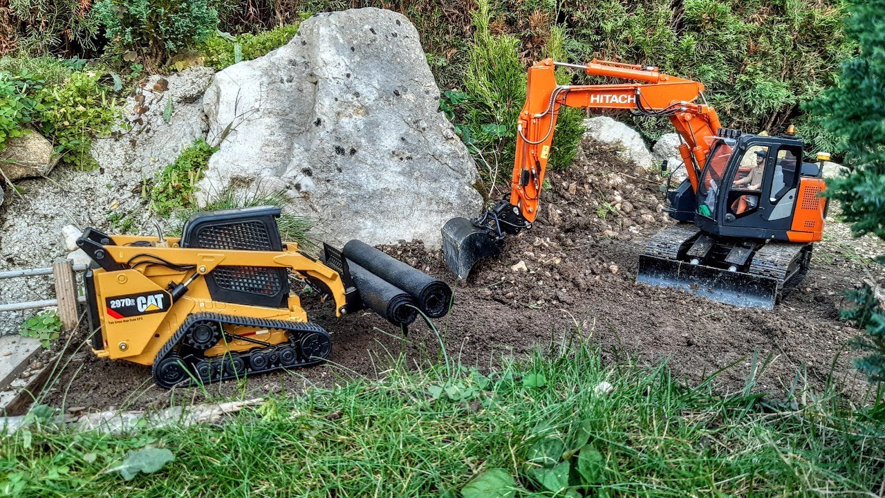 Building gravel road, Cat 297D2 compact track loader, Hitachi ZX135US 1:15 RC Scale excavator.