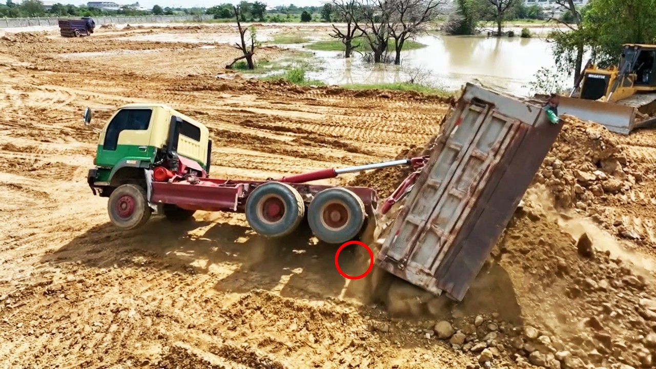 OMG!! Real-life Accident​ Dump Truck Lifts Straight Up After Bulldozer Push Truck Gone Wrong!