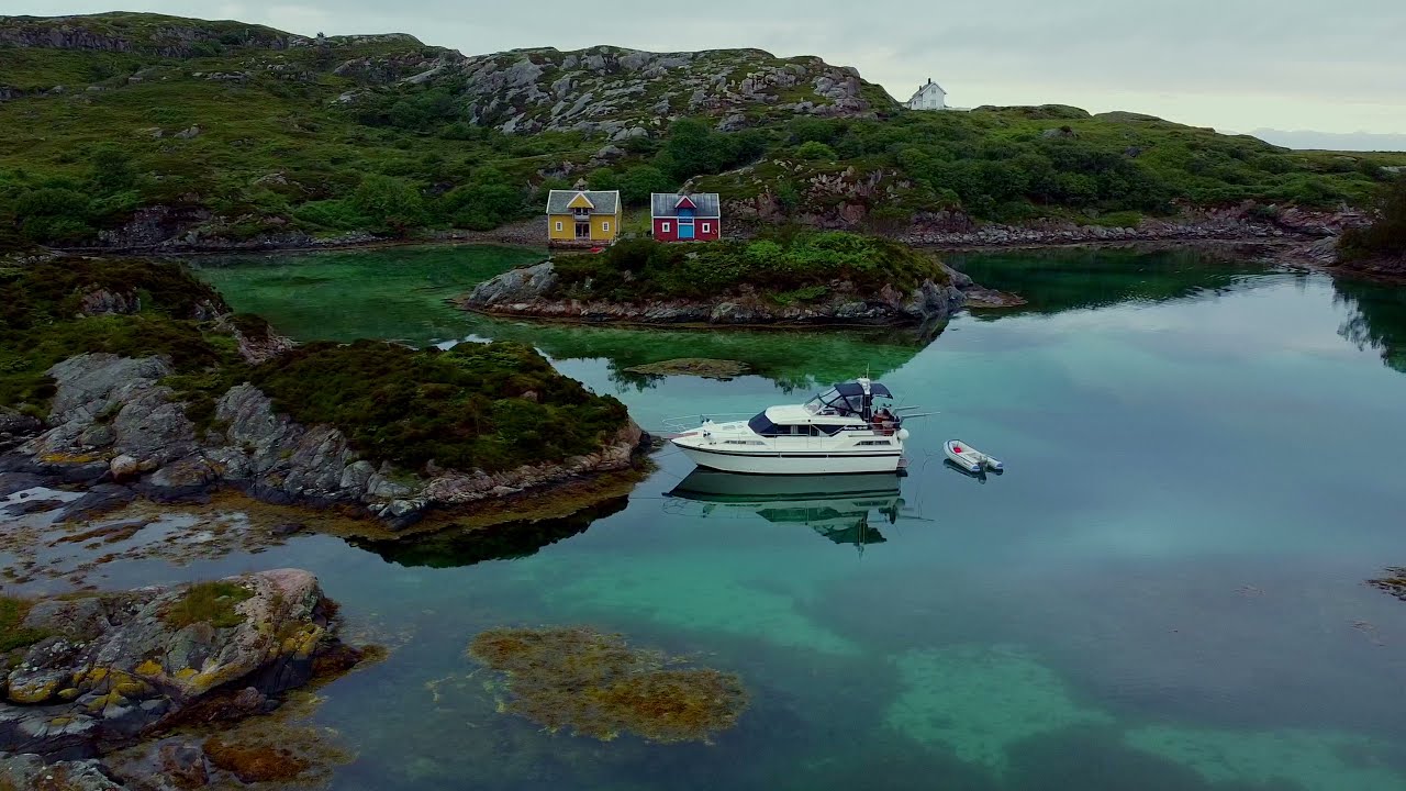 Boating in the coastal fjords of Norway. Austevoll summer.