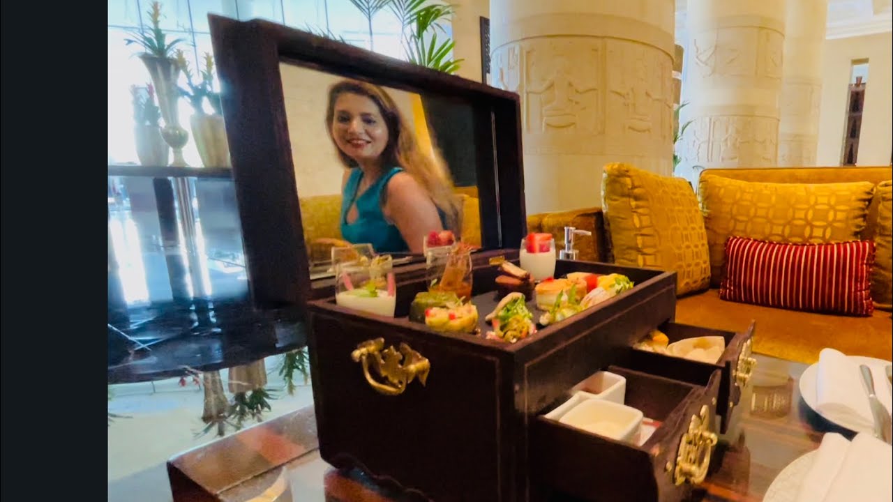My room and Afternoon Tea at the Raffles Hotel in Dubai