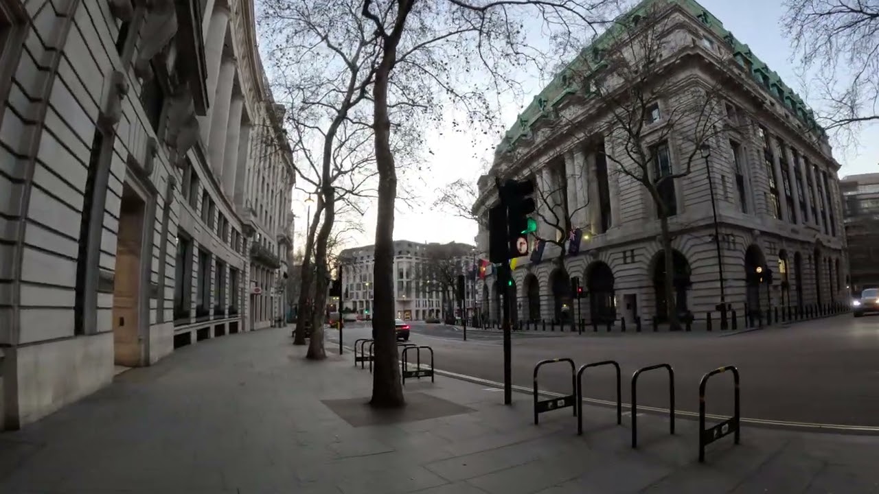 Walking through empty Central London streets at dawn