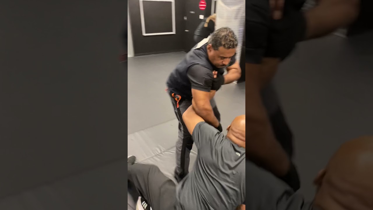Wrist Lock Takedown Countermeasure for Shoulder Grab Attack