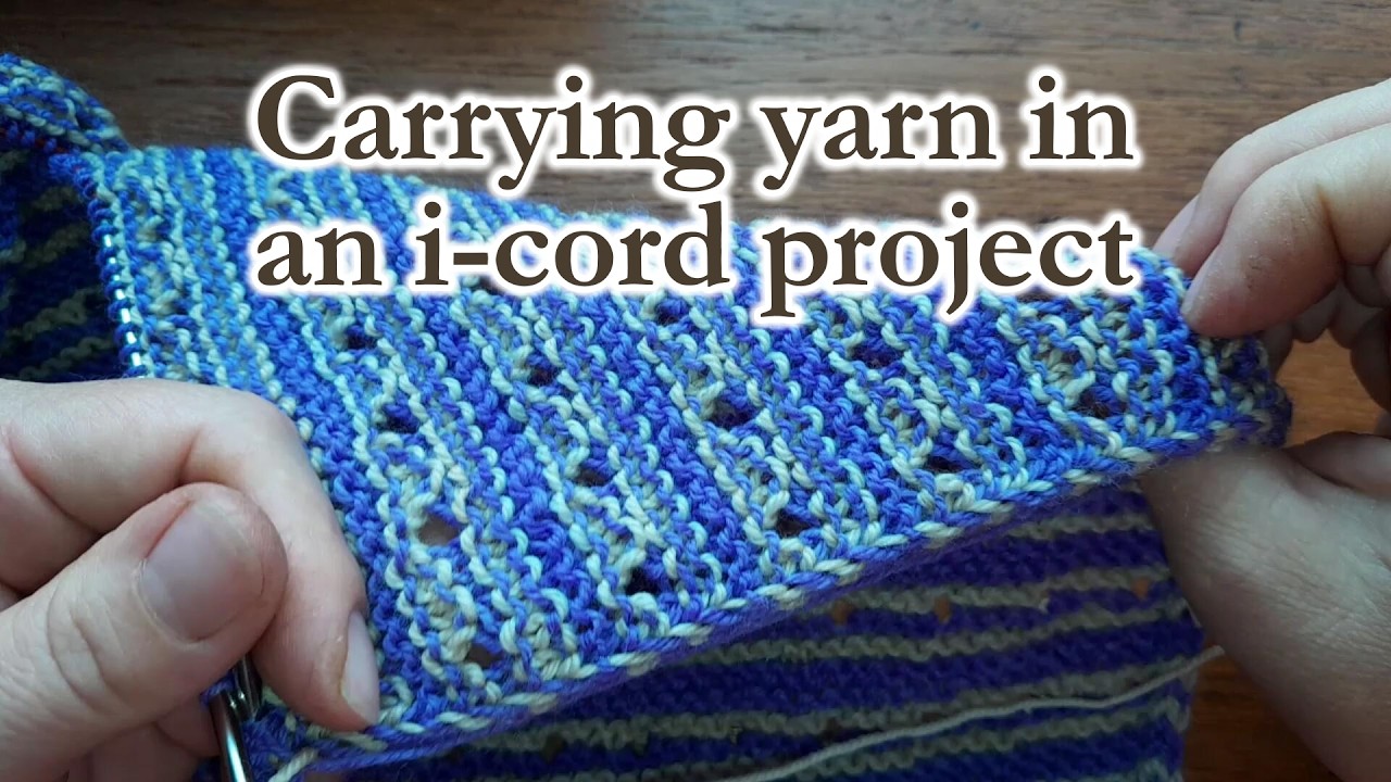 How to carry your yarn in garter when knitting a project with i cord as you go in two colours