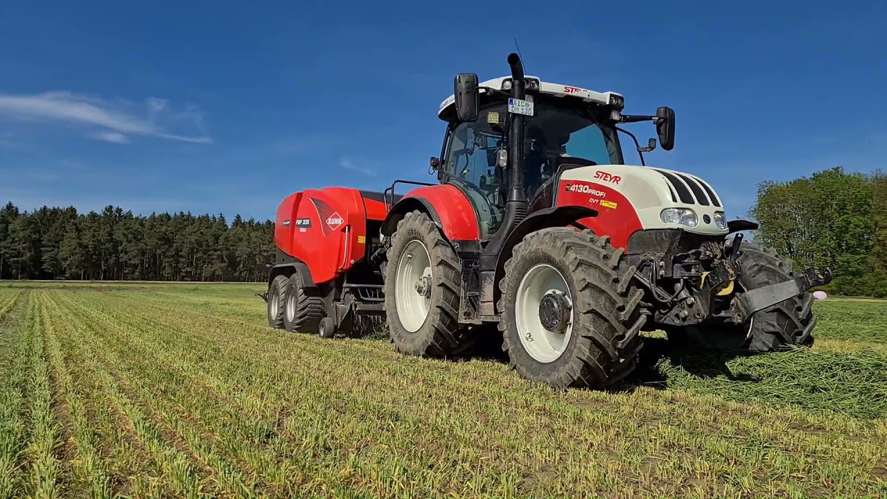Grünroggen pressen mit Steyr Profi 4130 CVT + Kuhn Intelliwrap FBP 3135