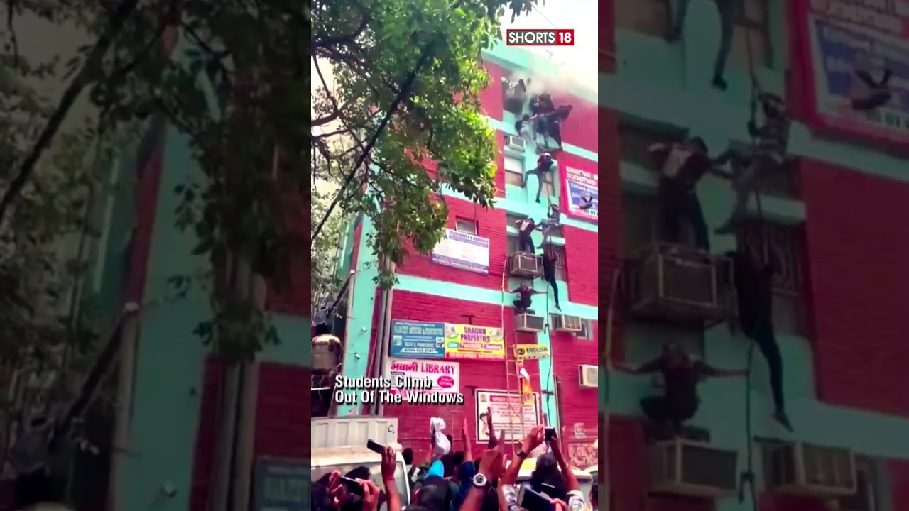 Fire Breaks Out in A Building in Mukherjee Nagar | Students Escape From Windows | #shorts
