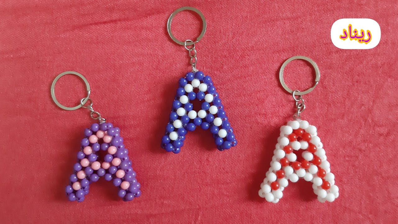 ميدالية حرف A من الخرز 💙❤