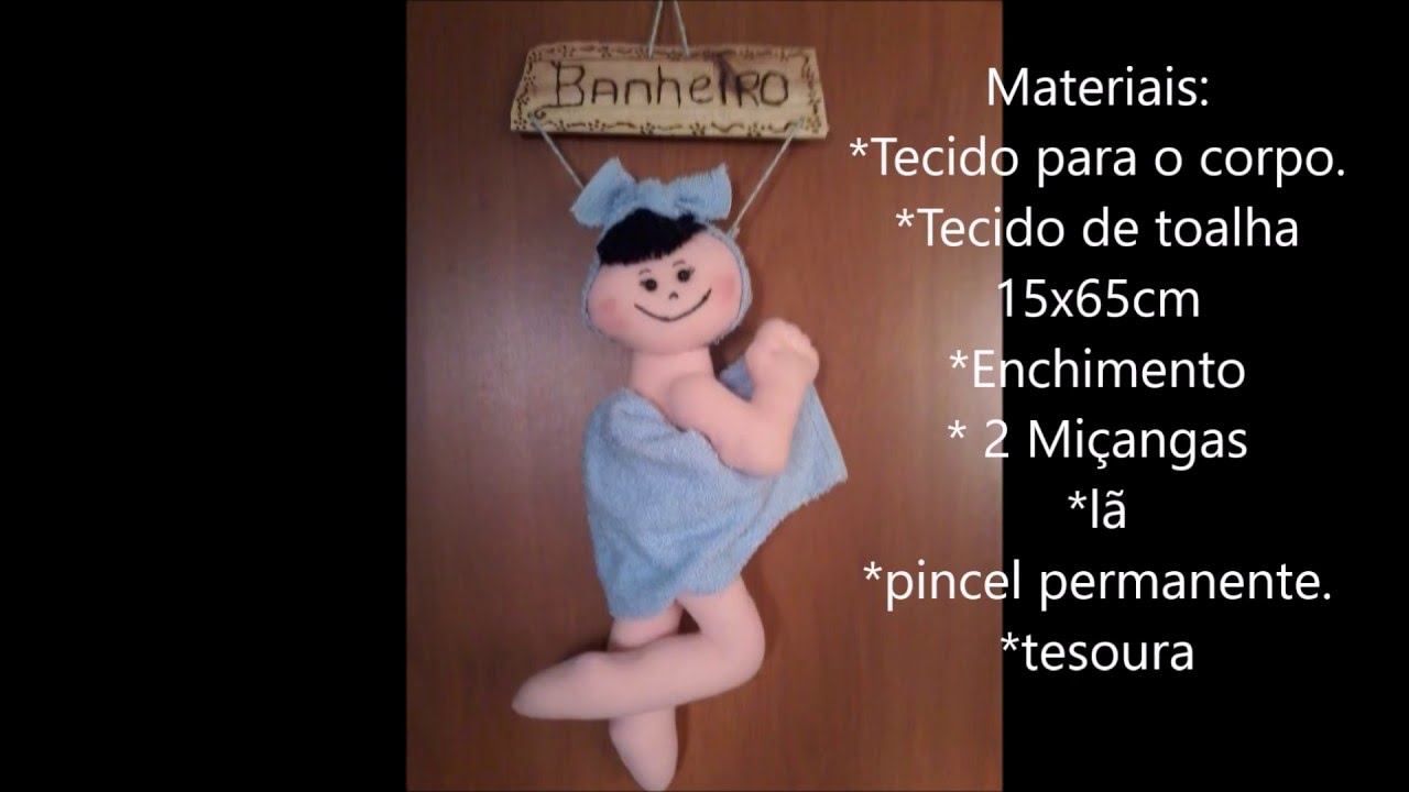boneca de toalha para porta de banheiro