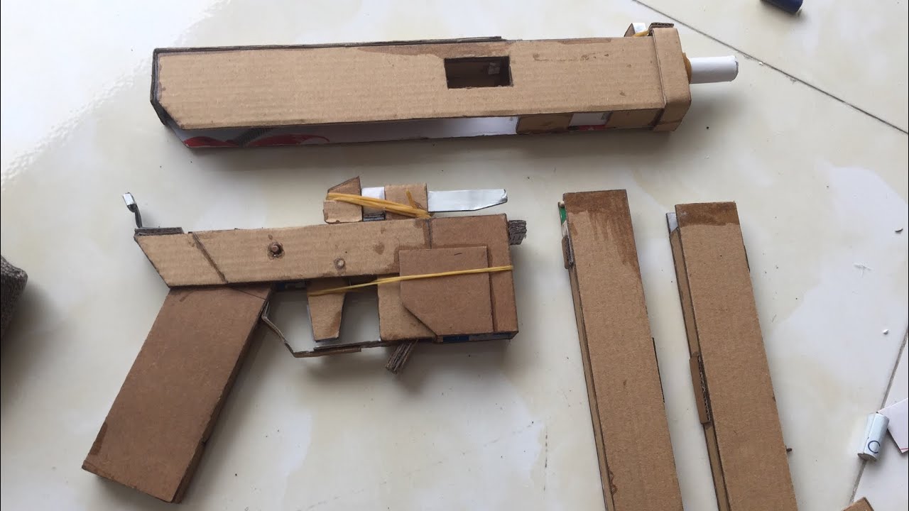I made cardboard gun (SP-9) that really shoot