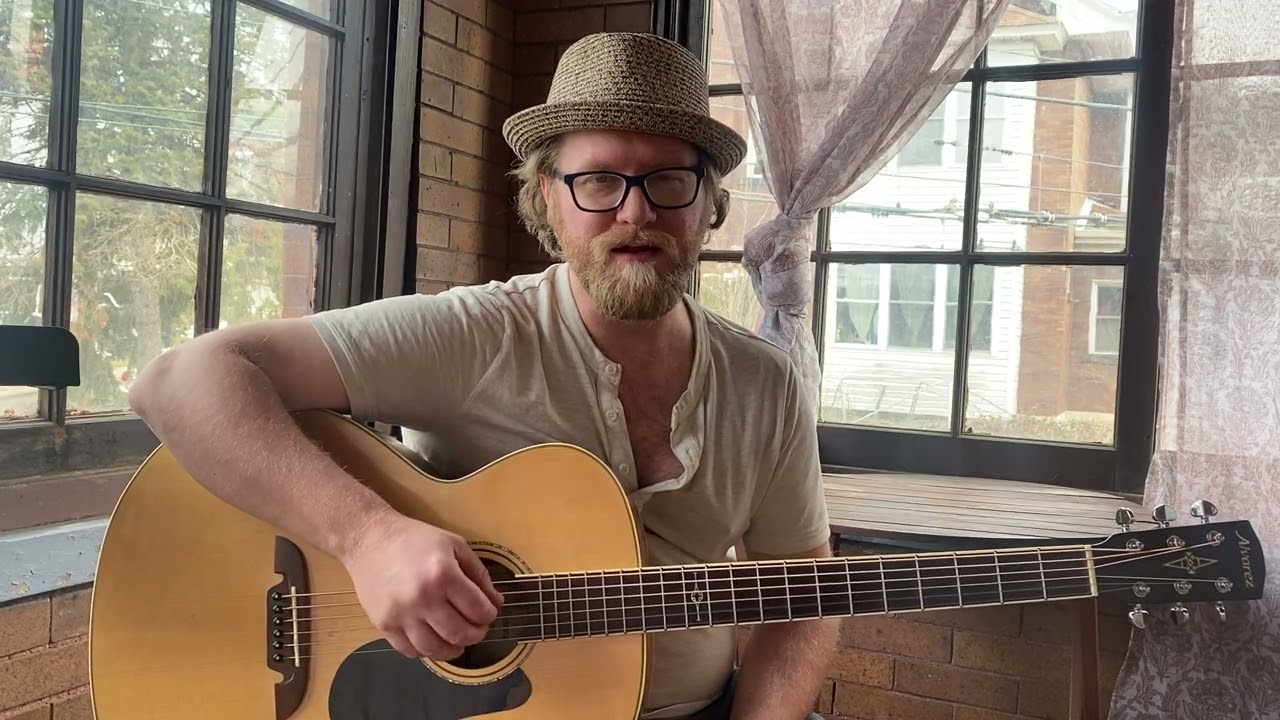 Fingerstyle jazz guitar comping on a baritone acoustic guitar