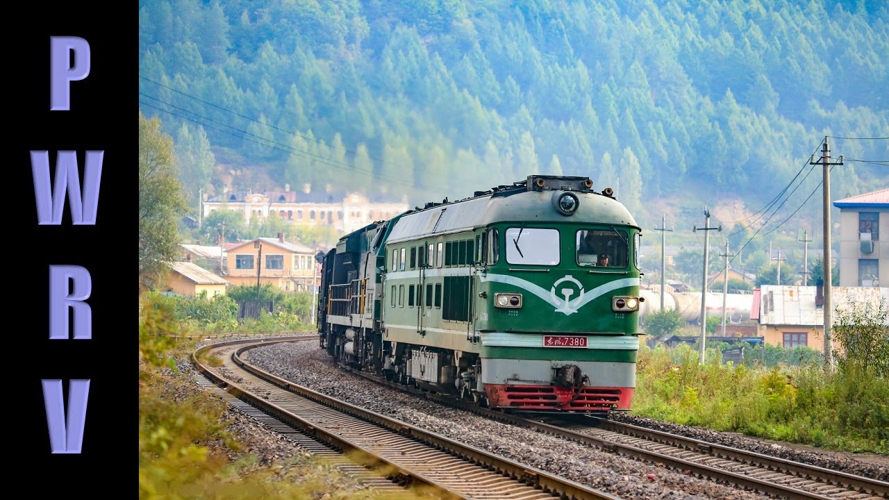 Chinese Railways - DF4B Diesel Assists a HXN5 With Freight Train Through Hengdaohezi, Northern China