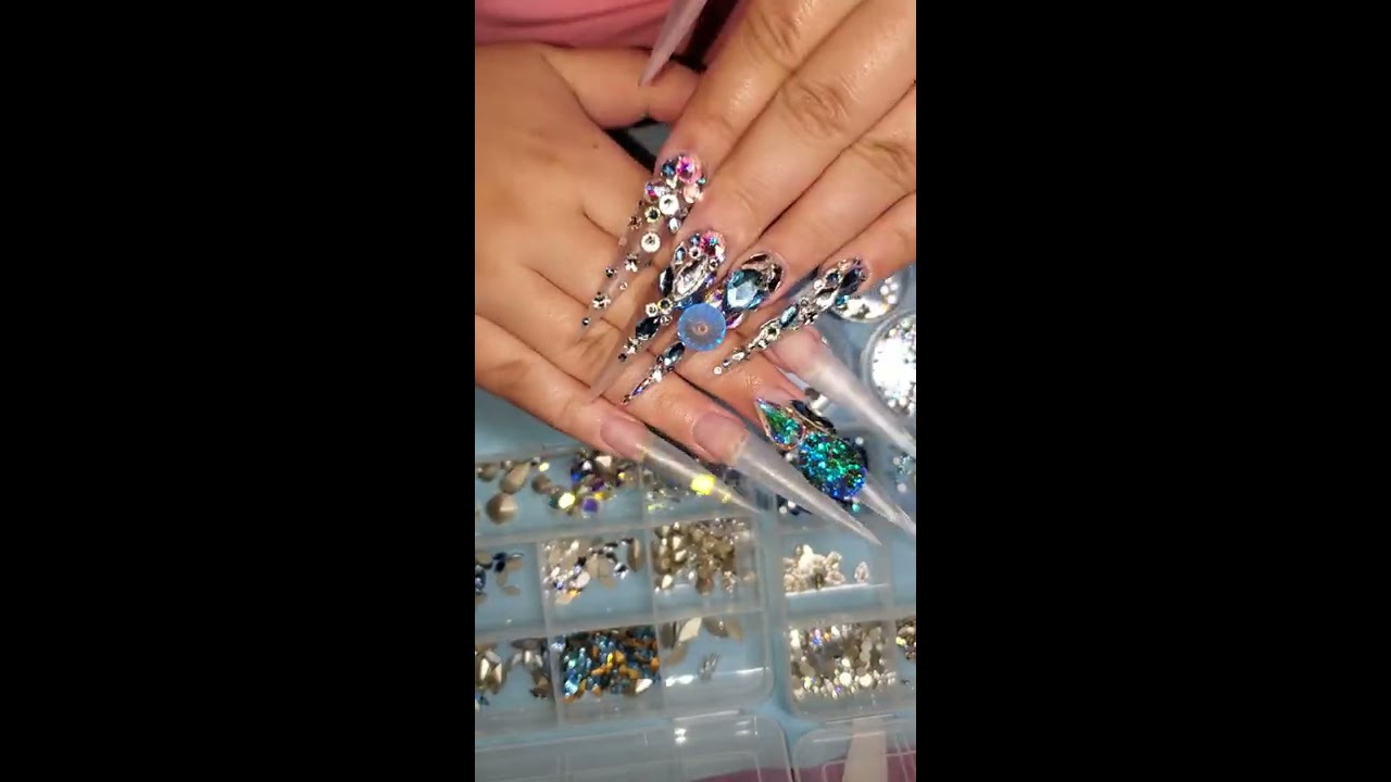 Apply large crystals on nails using Zulay Bling adhesive