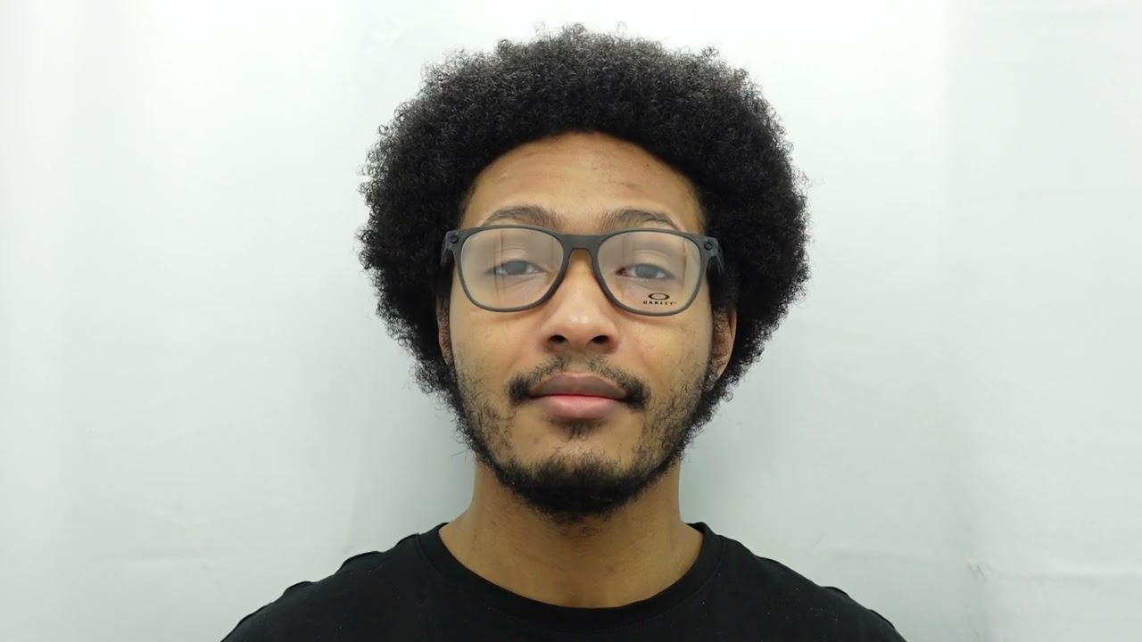 Male model wearing Oakley RX Ojector 8177-02 56mm Glasses