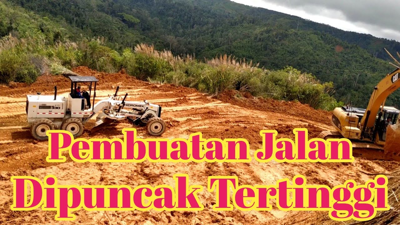 motor greder bekerja di lokasi extreme
