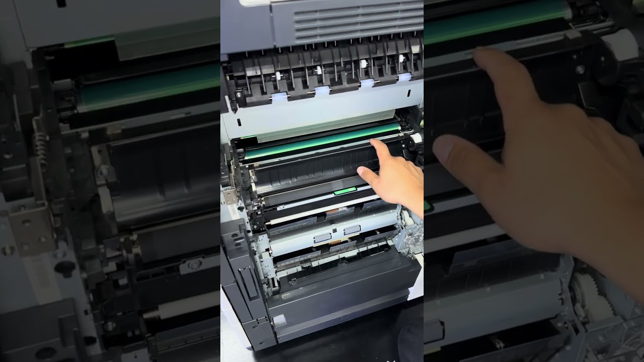 Cómo limpiar el sensor bajo la unidad de transferencia de Konica Minolta Bizhub Serie 4/8