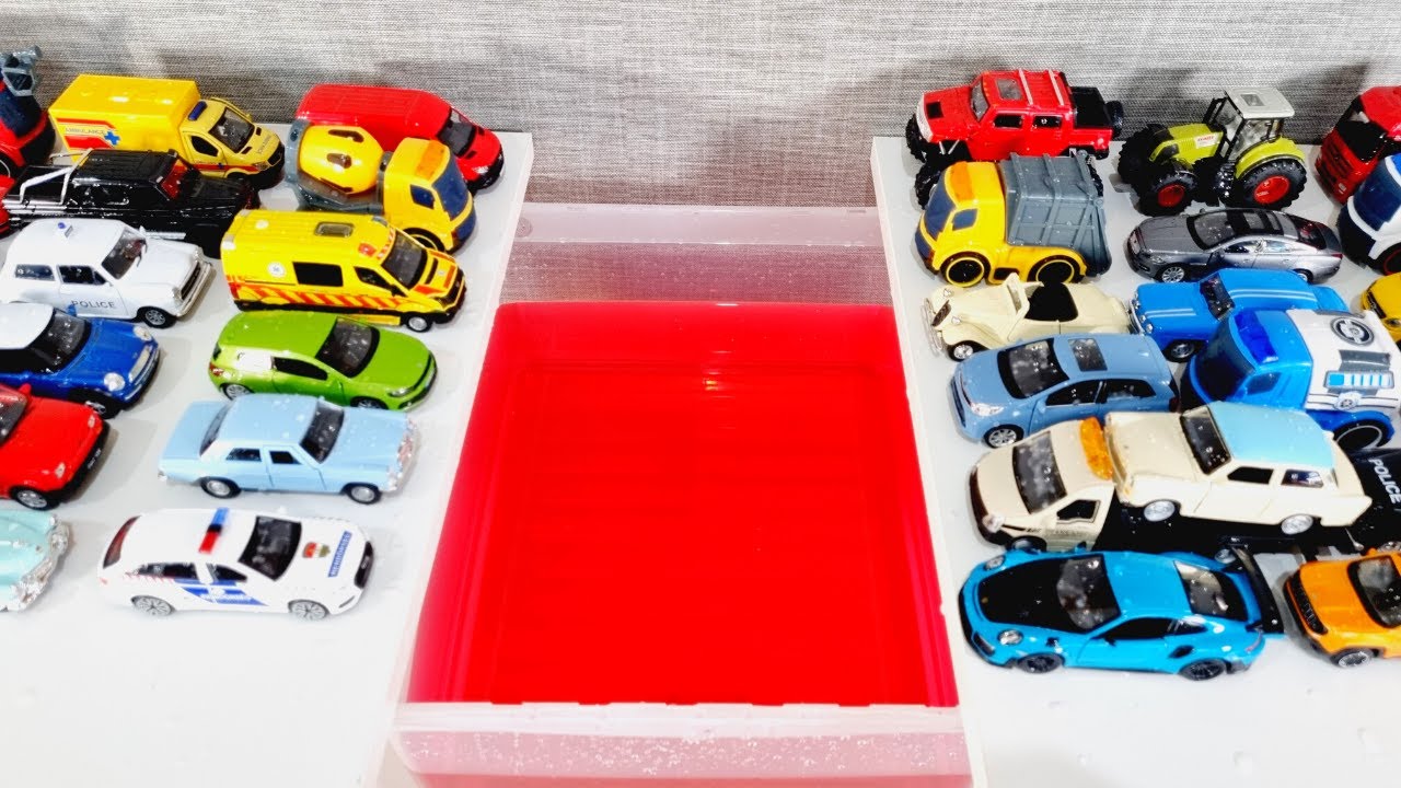Various cars sliding and falling into water