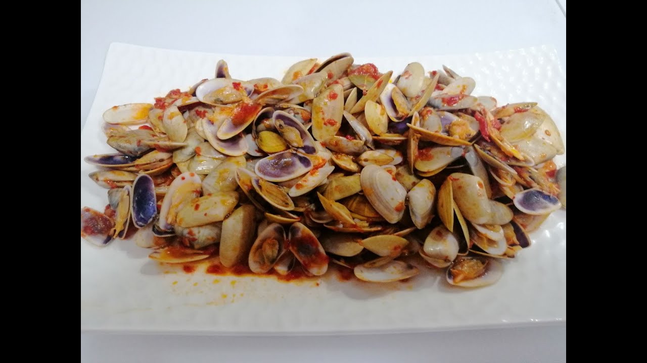 Coquinas o tellinas con tomate