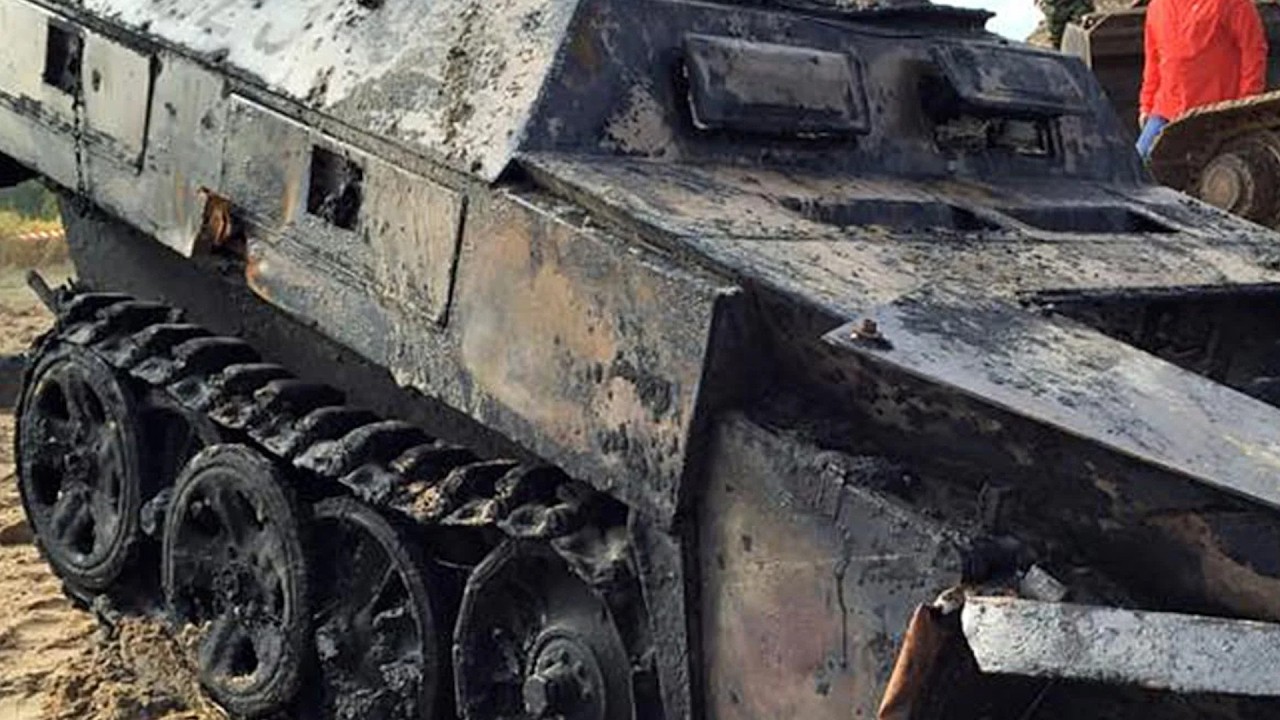 Military hunters have found a sunken World War II half-track transporter after 70 years.