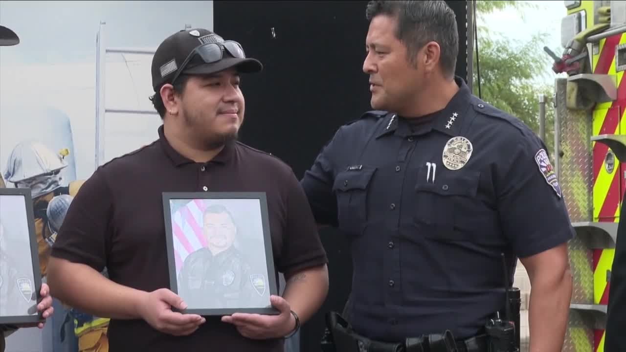 Officer Gabriel Facio's son accepts posthumous honor for fallen hero