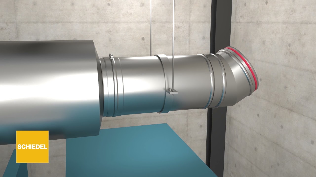 Chimney flue installation, with a noise reducing silencer in a commercial factory building.