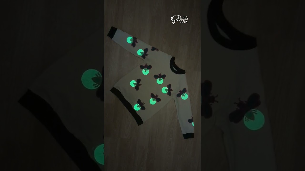 Glowing in the dark - firefly sweater! Amazing! 