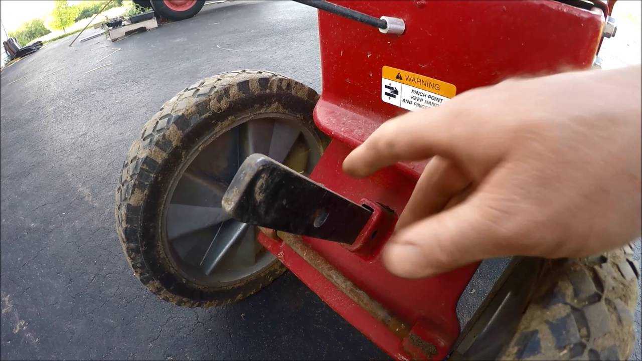 How to change the depth of your roto triller. Earthquake from Menards.