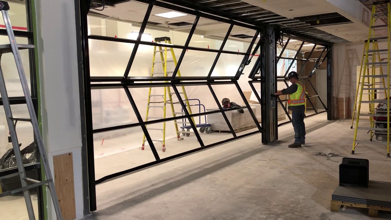 QC Installations - Hydraulic Bi-Fold Door Installation